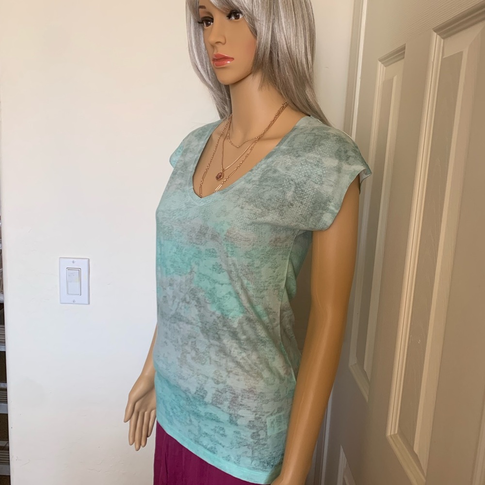 The North Face Women’s Luminous Performance Yoga Tee